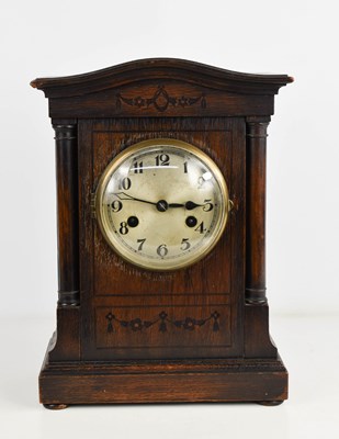 Lot 45 - A 1940s oak cased mantle clock, with Arabic...