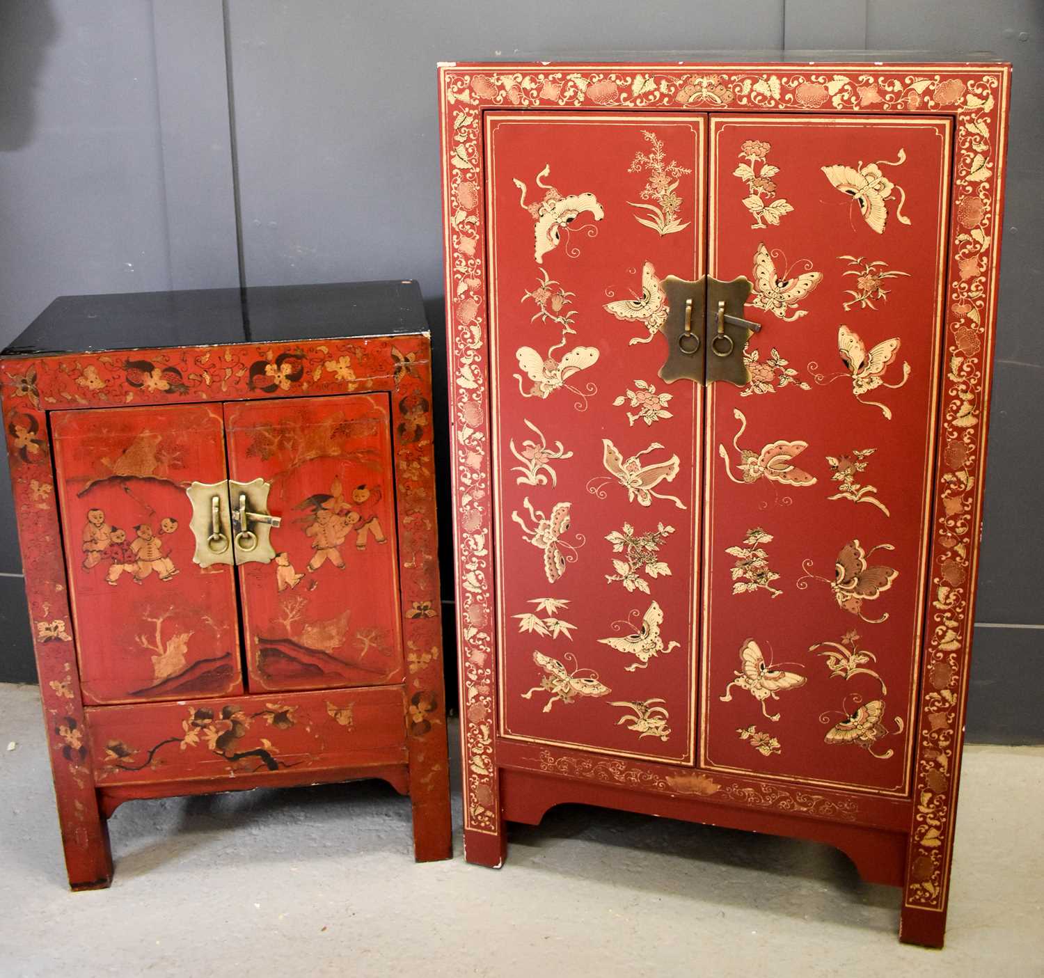 Lot 496 - Two Chinese red lacquered cabinets, one...