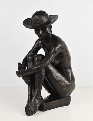 Lot 139 - A bronze style sculpture, nude woman wearing a...