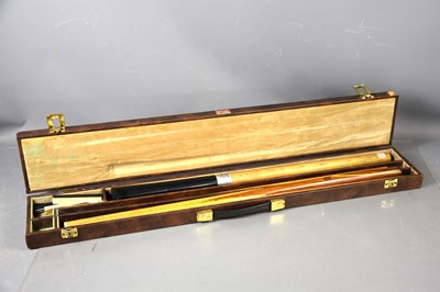 Lot 332 - A vintage Goldmaster snooker cue in a hard case.