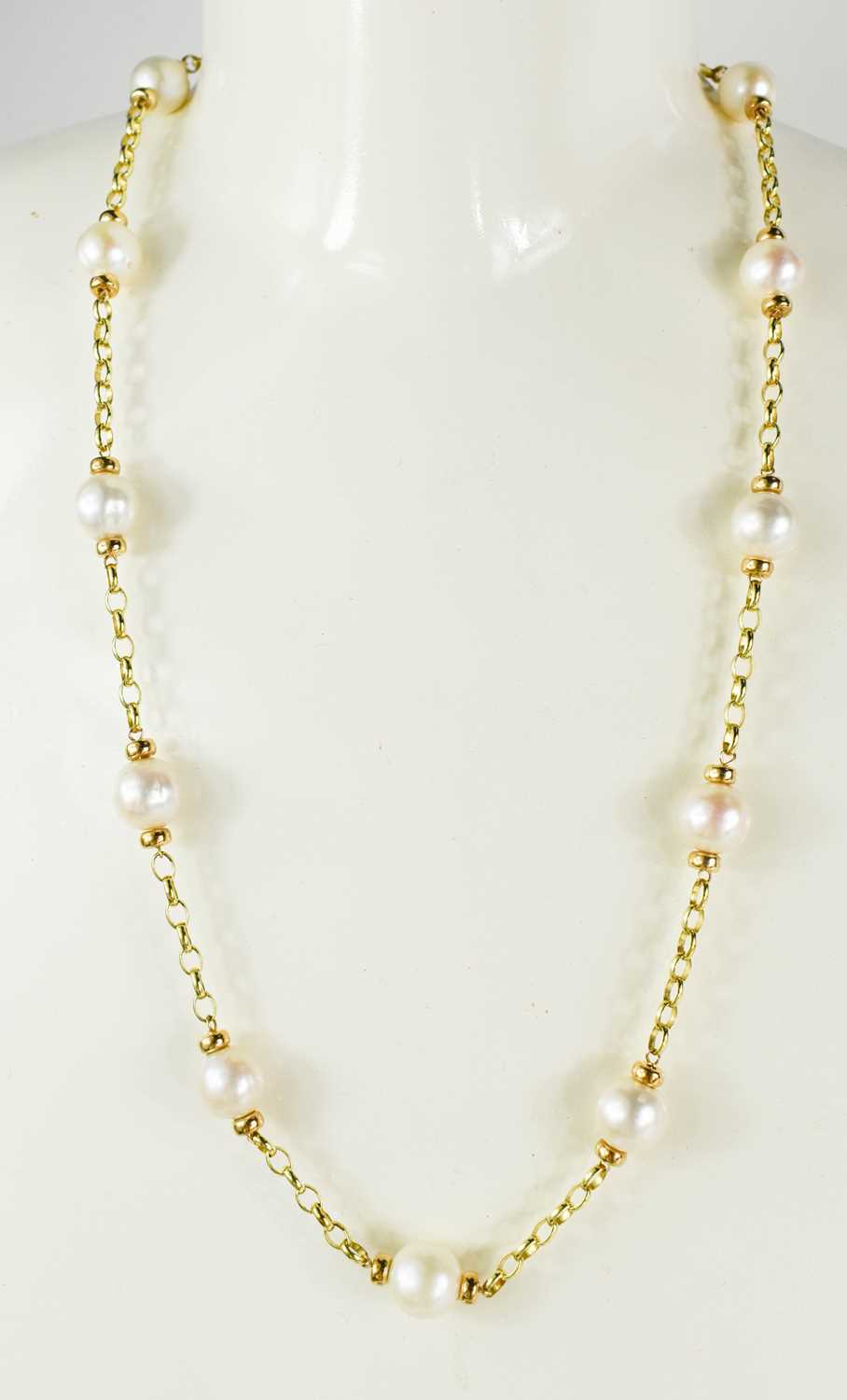 Lot 30 - A 9ct gold and pearl necklace, each pearl...