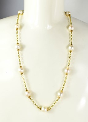 Lot 7 - A 9ct gold and pearl necklace, each pearl...