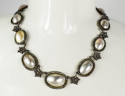 Lot 43 - An early Victorian silver and pearl pendant...