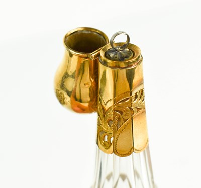 Lot 19 - A fine cut glass and gold plated scent bottle,...