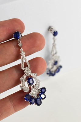 Lot 10 - A pair of 18ct gold, diamond and sapphire...
