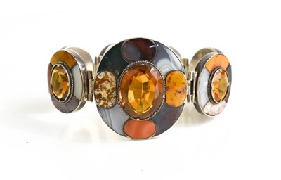 Lot 31 - A Scottish silver, agate and yellow topaz set...