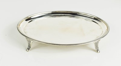Lot 131 - A silver card tray, of oval form, with splayed...