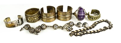 Lot 129 - A group of silver bangles to include an Art...