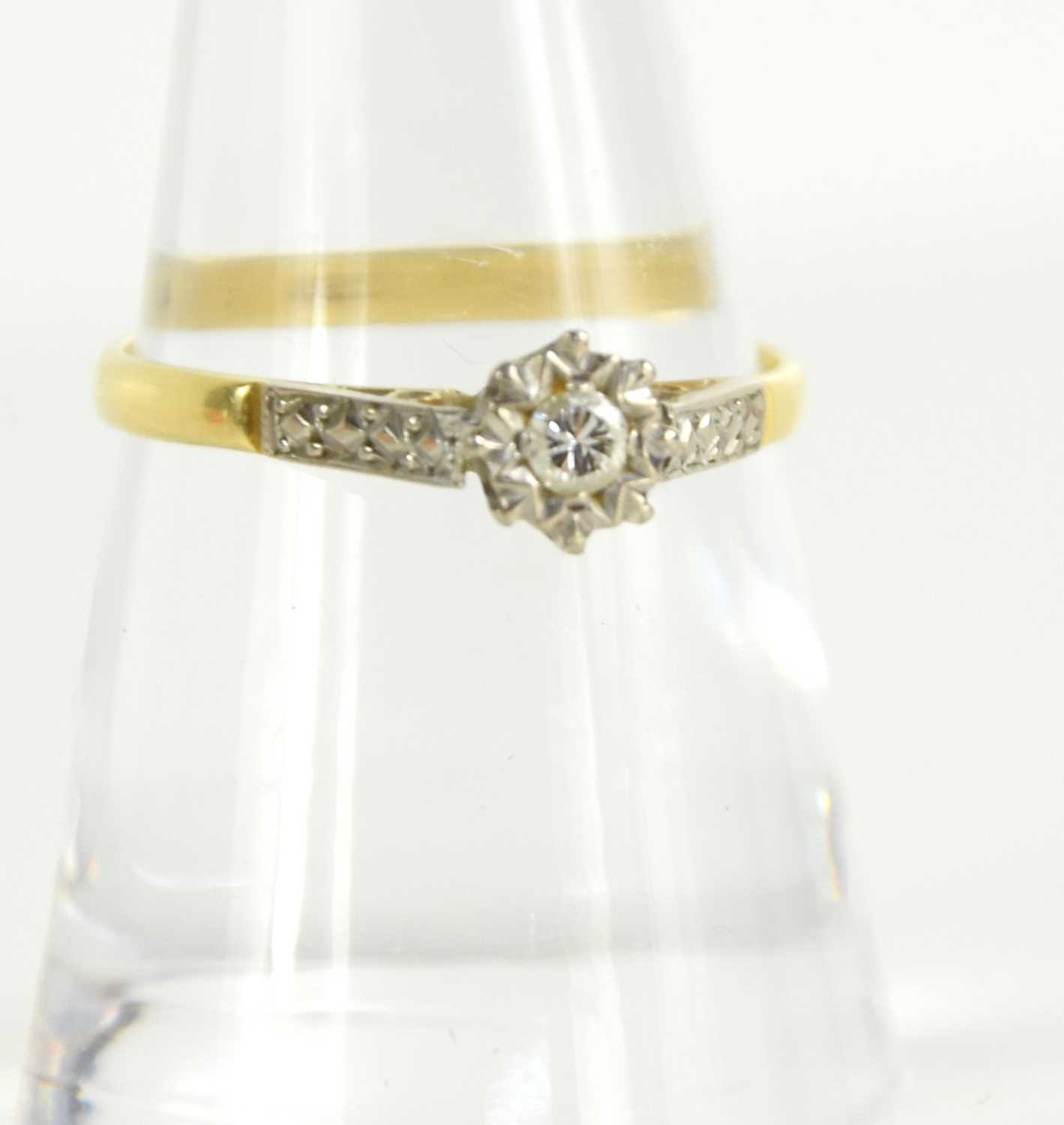 Lot 306 - A 9ct gold and diamond, illusion set solitaire...