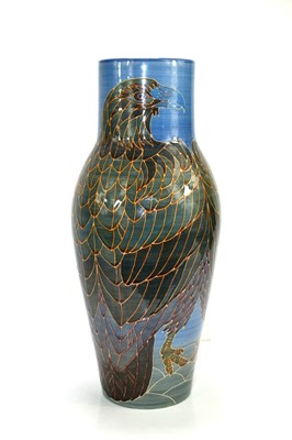 Lot 160 - A Dennis China Works pottery vase, blue ground...