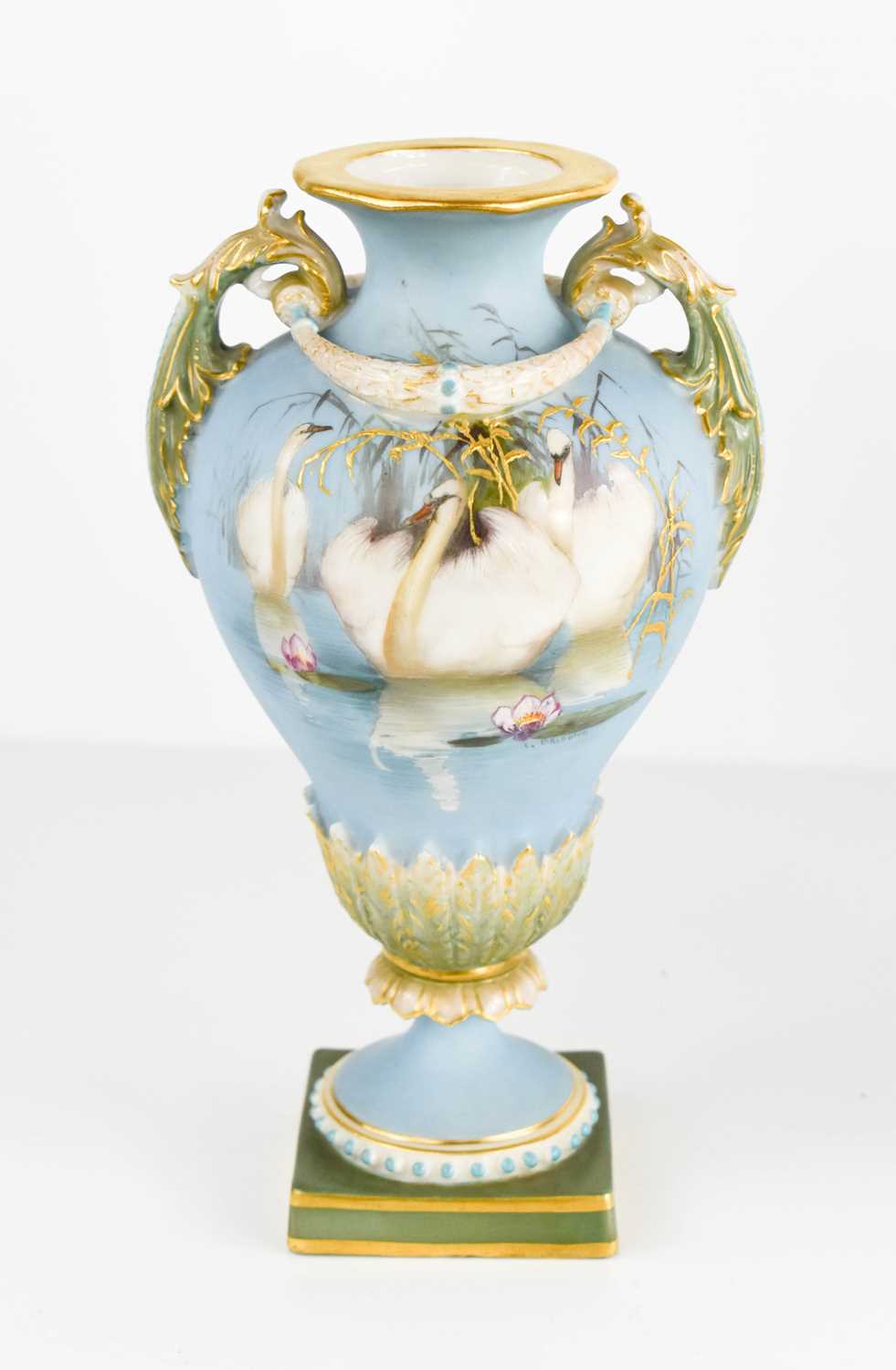 Lot 124 - A Royal Worcester Charles Baldwin twin handled...