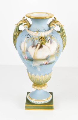 Lot 124 - A Royal Worcester Charles Baldwin twin handled...