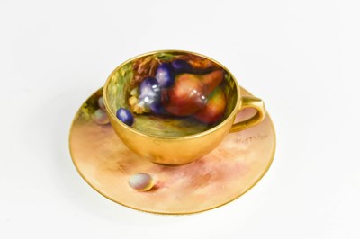 Lot 477 - A Royal Worcester miniature cup and saucer,...