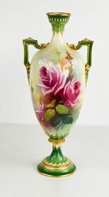 Lot 483 - A Royal Worcester slender vase with twin...