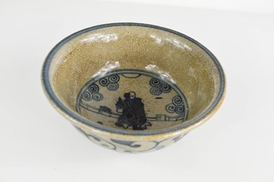 Lot 519 - A Chinese stoneware bowl, with figure painted...