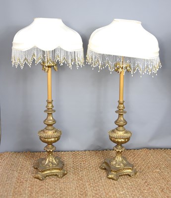 Lot 595 - A pair of 19th century brass standard lamps, ,...