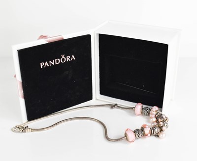 Lot 129 - A Pandora white metal necklace with thirteen...