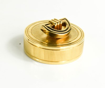Lot 2 - A 9ct gold pill box and lid, by Cartier, the...