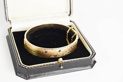 Lot 160 - A 9ct gold bracelet with safety chain, set...