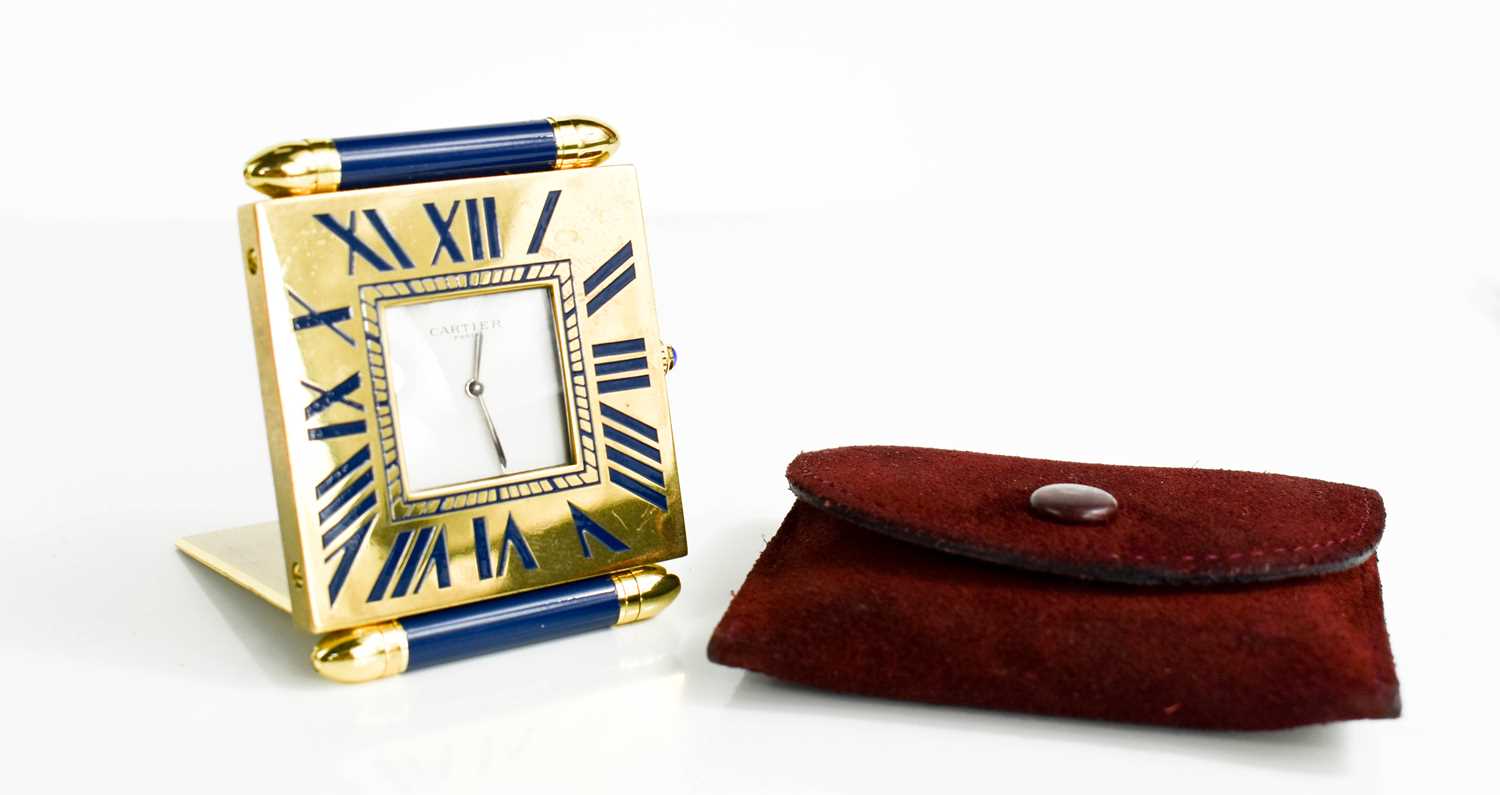 Lot 1 - A Cartier travel clock, Quartz, reg no....