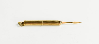 Lot 130 - A 9ct gold toothpick, stamped 375, 6g.