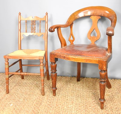 Lot 596 - A 19th century mahogany desk chair with red...