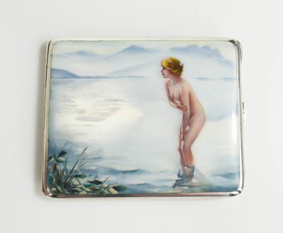 Lot 463 - A silver and enamel cigarette case with a nude...