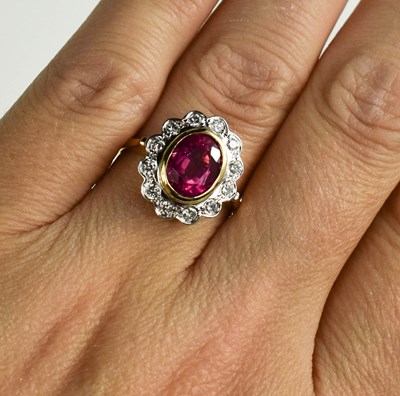 Lot 177 - An 18ct yellow and white gold, pink tourmaline...