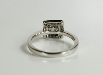 Lot 167 - An 18ct white gold and diamond ring, the...