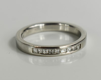 Lot 150 - A platinum and diamond eternity ring, composed...