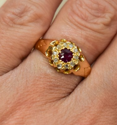 Lot 155 - An 18ct gold and old cut diamond and ruby ring,...