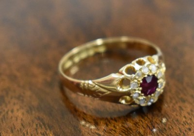 Lot 155 - An 18ct gold and old cut diamond and ruby ring,...