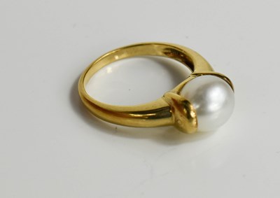 Lot 28 - A 9ct gold and pearl ring, size O, 3.5g.