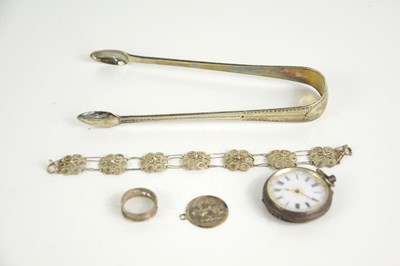 Lot 339 - A group of silver items to include a pair of...