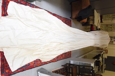 Lot 587 - A Norman Hartwell hand stitched wedding dress,...