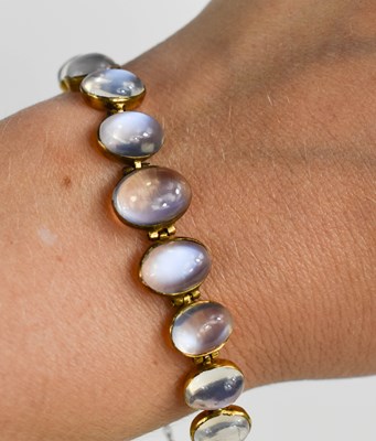 Lot 6 - A Victorian moonstone and gold bracelet...