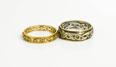 Lot 98 - Two 9ct gold and diamond eternity rings, Size...