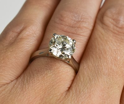 Lot 180 - A stunning platinum and diamond solitaire ring,...