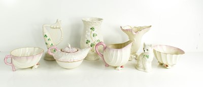 Lot 526 - A group of Belleek pottery to include a teapot,...