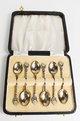 Lot 359 - A set of six silver and enamel teaspoons, the...