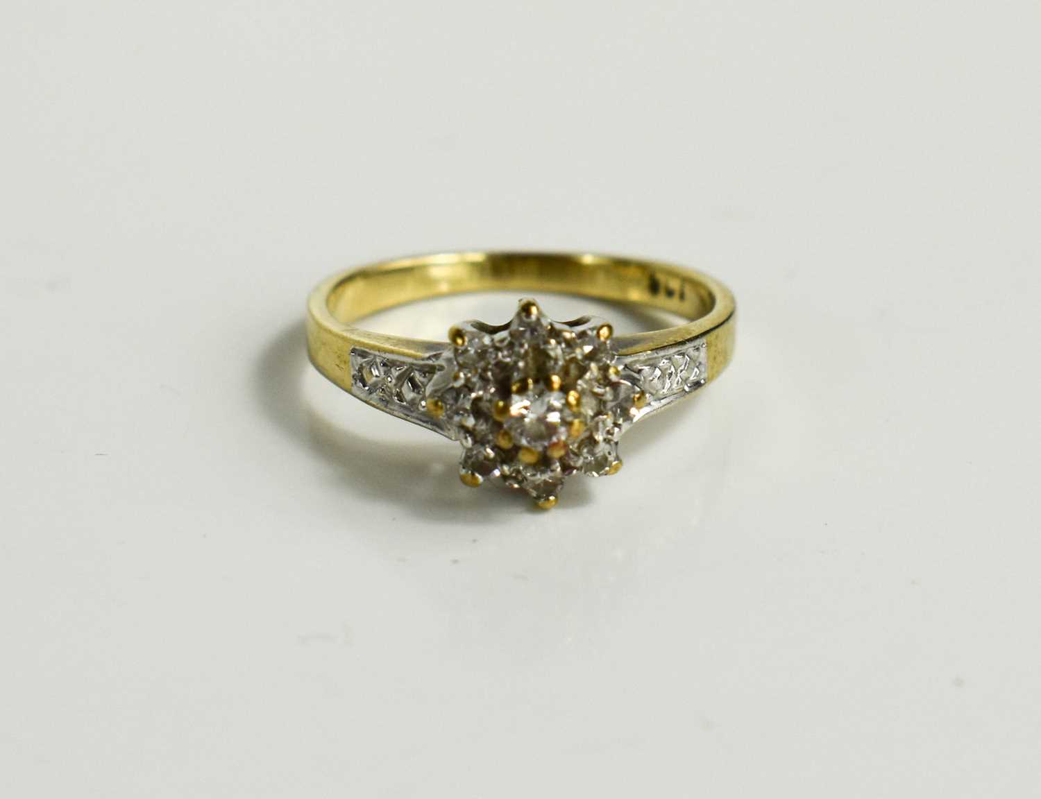 Lot 72 - A 9ct gold and diamond flowerhead ring, size K,...