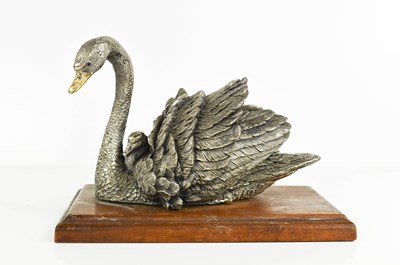 Lot 458 - A silver model swan and cygnet, with gilded...