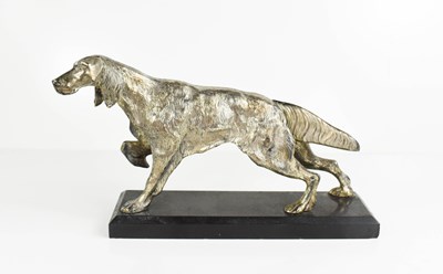 Lot 398 - A white metal model spaniel, with detailed...