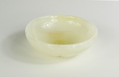 Lot 547 - A Chinese white jade bowl with polished finish,...