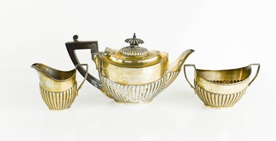 Lot 451 - A silver tea for one, including tea pot, milk...