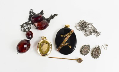 Lot 287 - A Victorian jet and seed pearl pendant,...