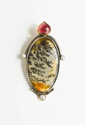 Lot 7 - A silver, garnet, seed pearl and moss agate...