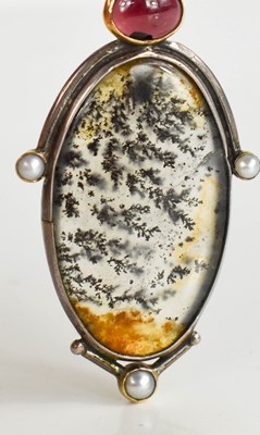 Lot 7 - A silver, garnet, seed pearl and moss agate...