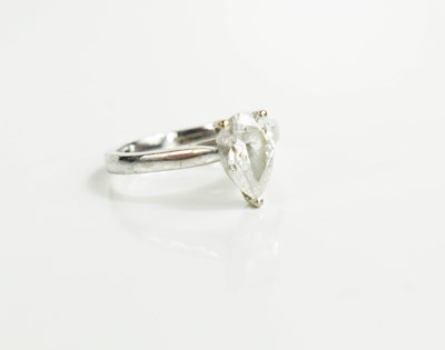 Lot 179 - An 18ct white gold and pear cut diamond...