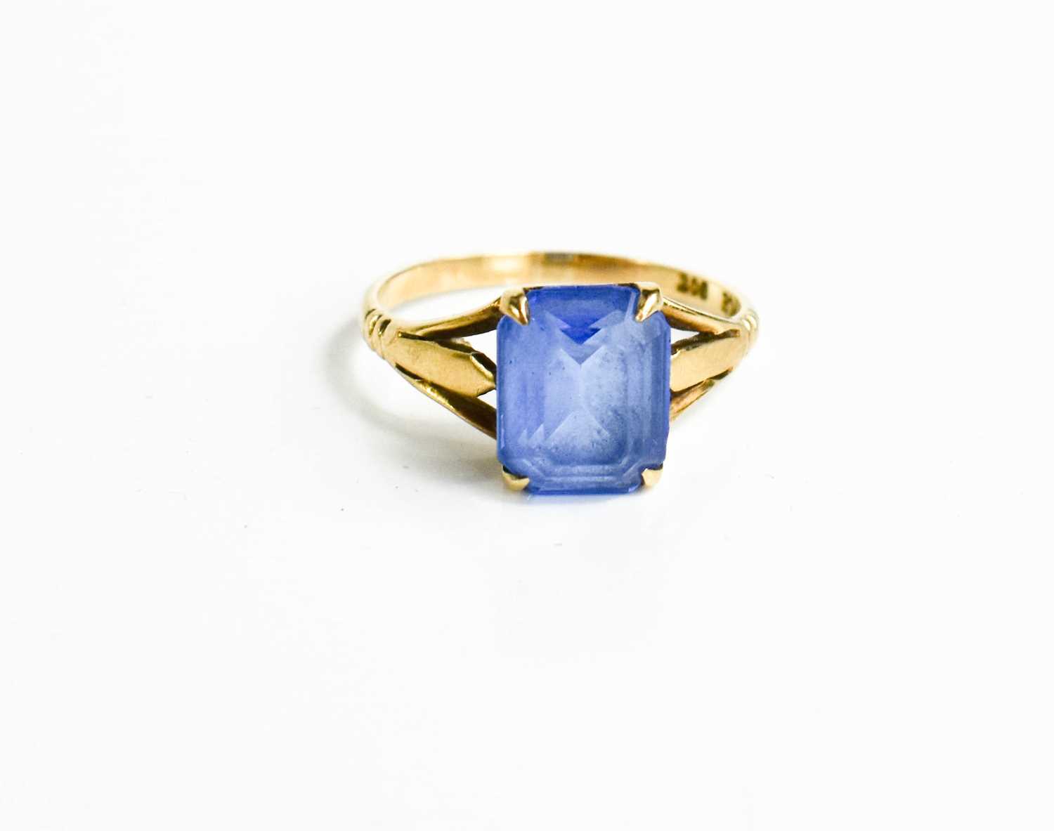 Lot 88 - A 9ct gold and blue paste dress ring, size P,...